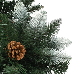 A 5 ft artificial Christmas tree with green branches, white glitter, and attached pine cones.