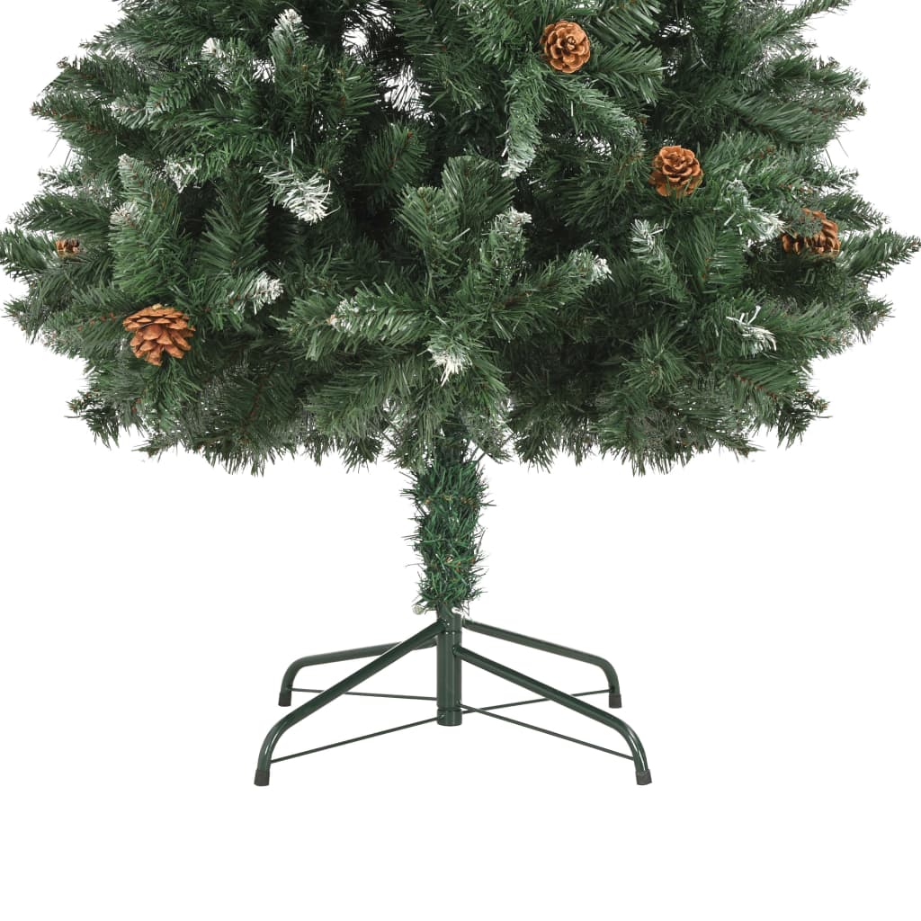 A 6ft artificial Christmas tree with green branches, white glitter, and attached pine cones on a metal stand.