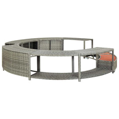 Gray poly rattan hot tub surround with built-in storage and a cutout for power packs