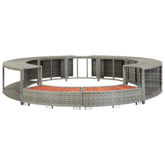 Gray poly rattan hot tub surround with curved design, storage compartments, and orange cushions.