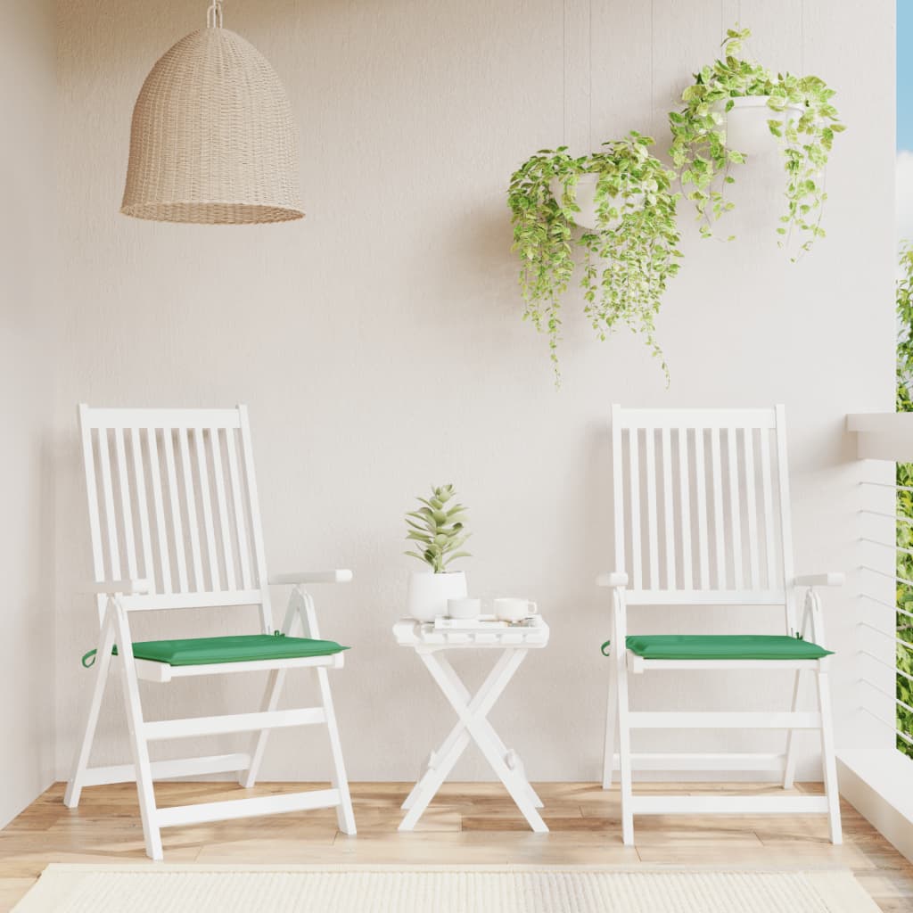 Two green Oxford fabric garden chair cushions with ties, sized 19.7x19.7x1.2 inches.