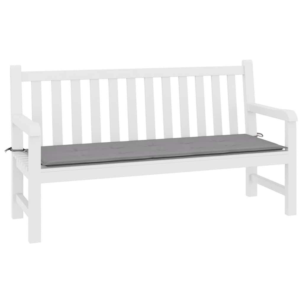 A white garden bench with a long, rectangular gray cushion secured by ties.