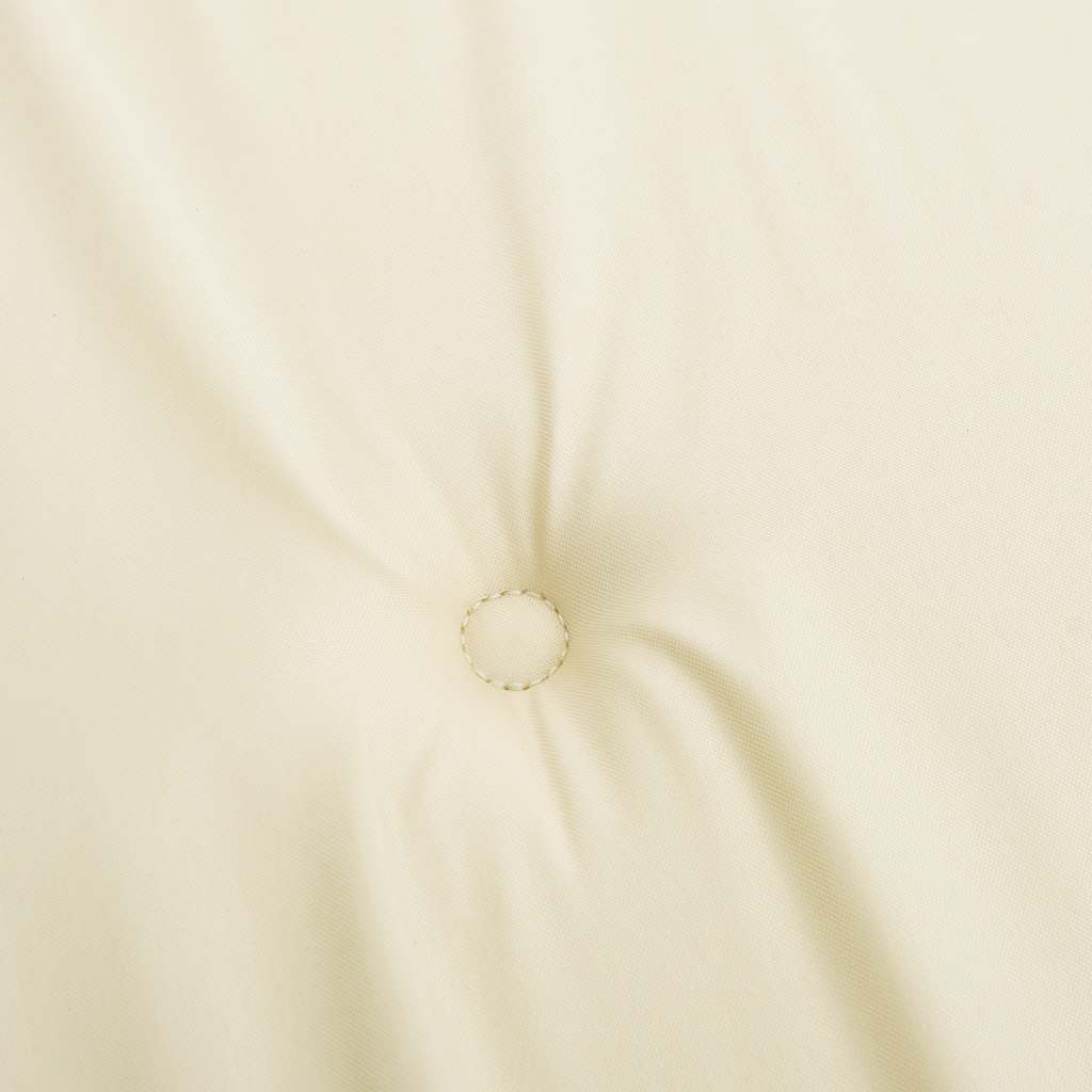 Cream garden bench cushion in Oxford fabric with tufted center and tie straps.
