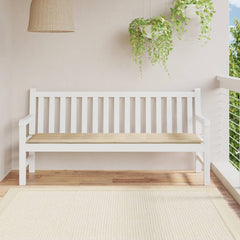 Beige Oxford fabric garden bench cushion on white wooden bench in sunny balcony setting.