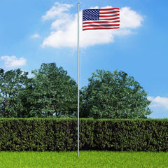 3x5 ft US flag made of durable polyester with brass grommets on a pole in a green yard.