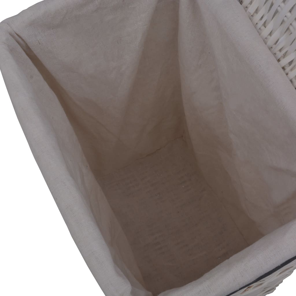 White woven willow laundry basket with open top and cut-out handles.