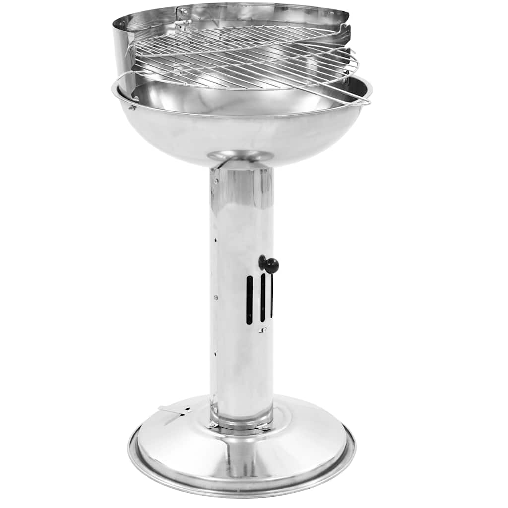 A stainless steel pedestal charcoal BBQ grill with a round basin and adjustable height.