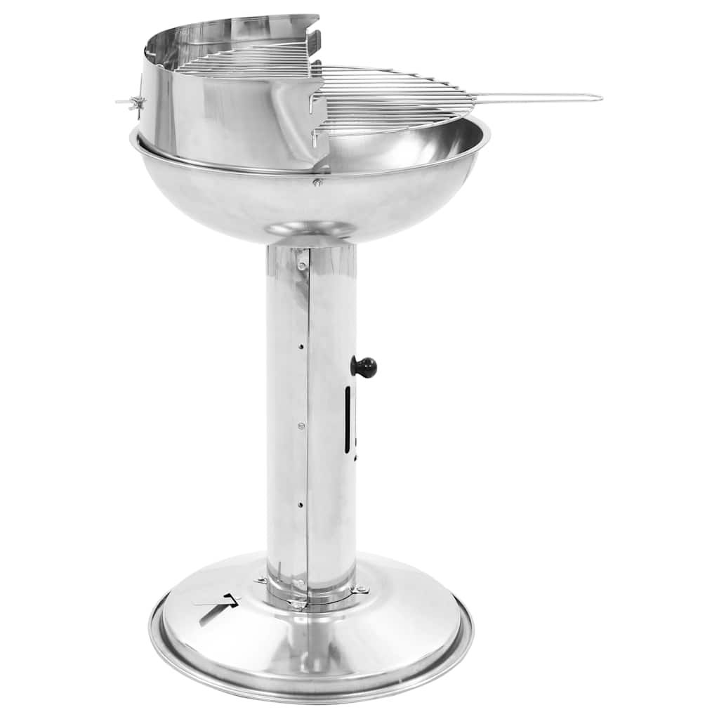 Stainless steel pedestal charcoal BBQ grill with adjustable height and windshield.