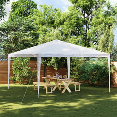 White 13.1x13.1 ft UV-resistant party tent set up in a backyard with a wooden picnic table.