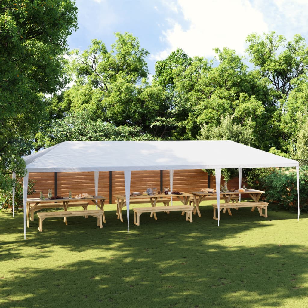 White 13.1'x29.5' party tent with UV water-resistant canopy set up in a grassy yard with picnic tables.