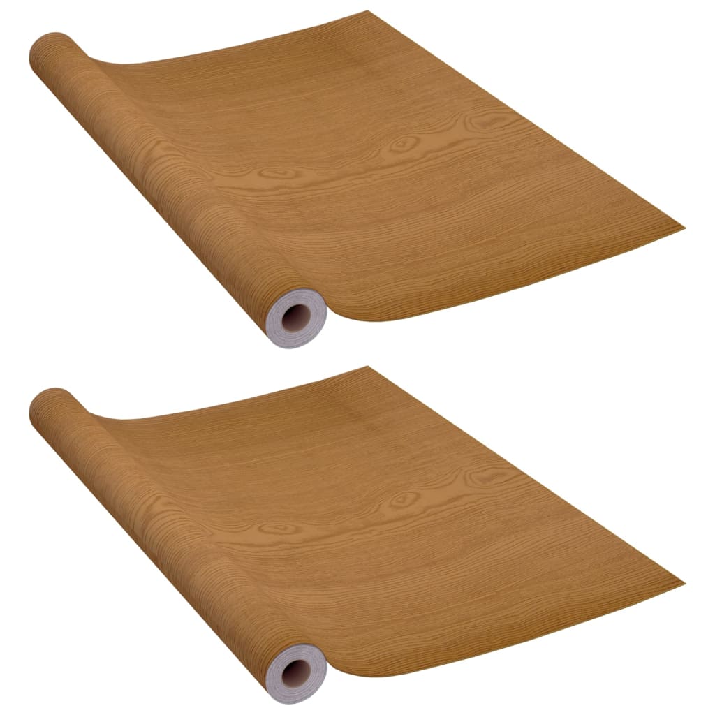 Two rolls of light oak wood grain self-adhesive PVC door film measuring 82.7 by 35.4 inches each.