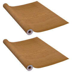 Two rolls of light oak wood grain self-adhesive PVC door film measuring 82.7 by 35.4 inches each.
