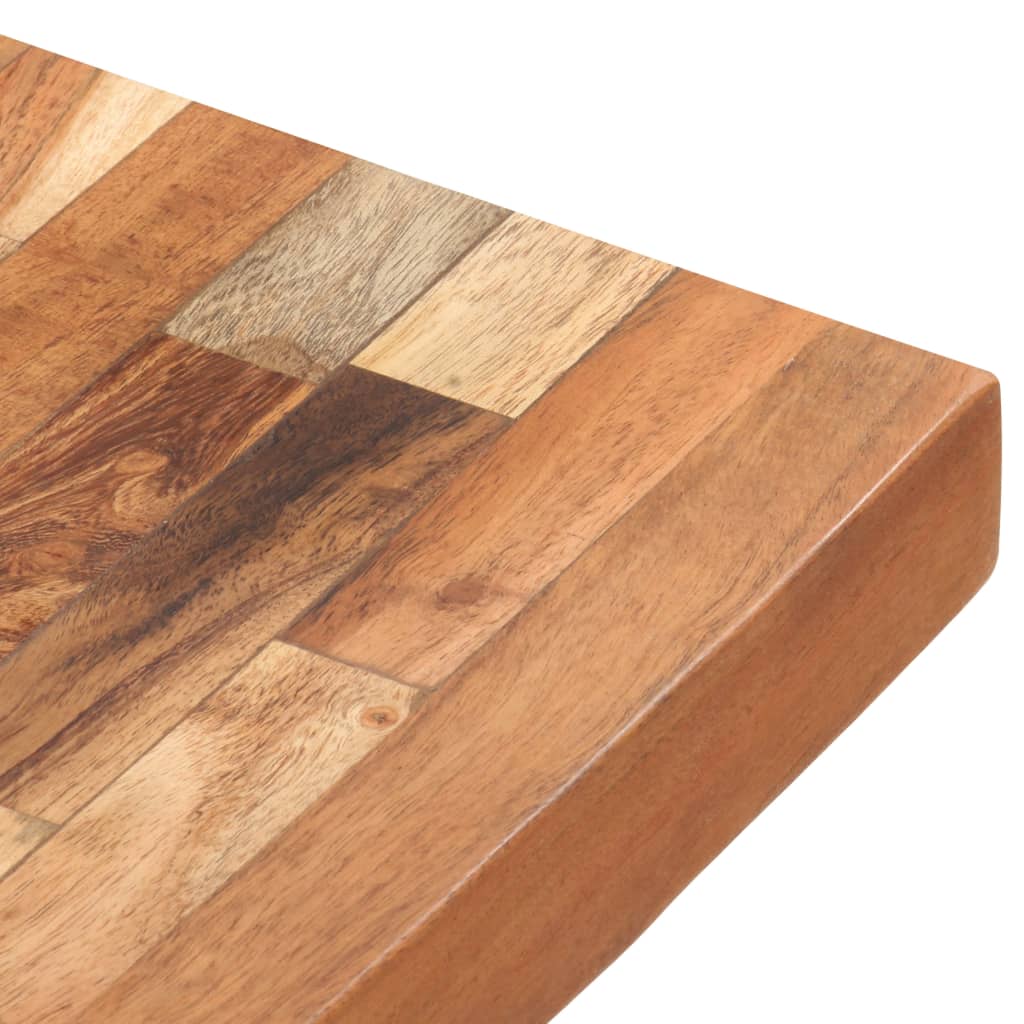 Close-up of a Bostome acacia wood chopping board with varied wood grain.