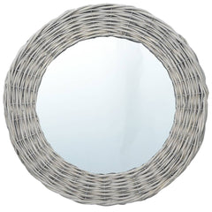 A 19.7-inch round wall mirror with a handwoven wicker rattan frame.