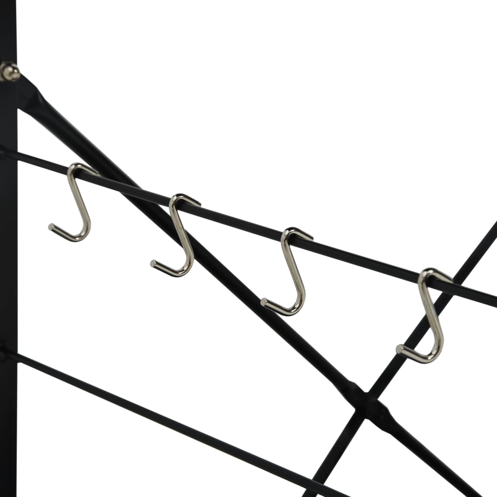 Four silver S-hooks hang from a black metal rod on a kitchen rack.