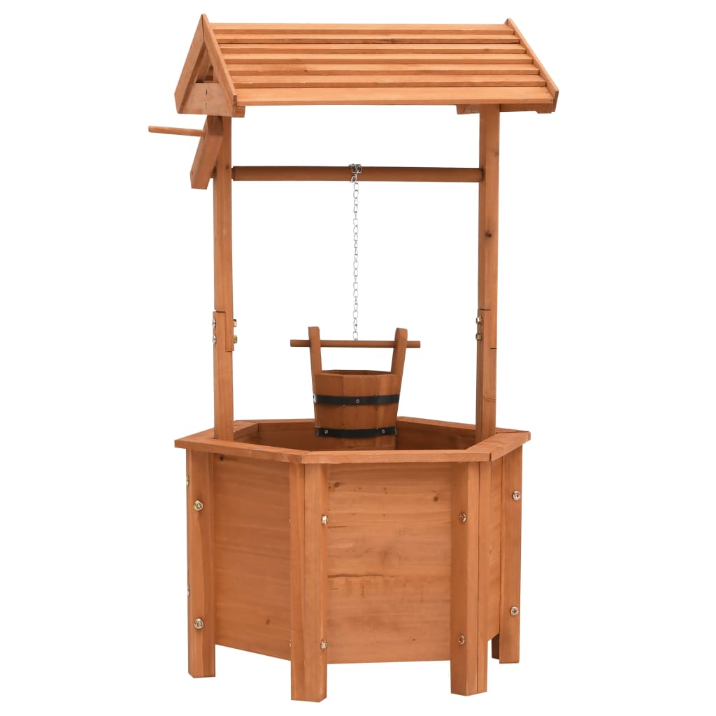 Wooden wishing well garden planter with hexagonal base, peaked roof, and hanging bucket.