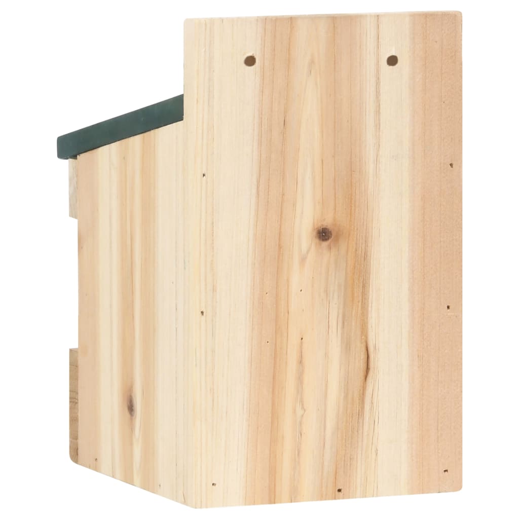 Wooden bird house with green sloped roof and pre-drilled holes, side view.
