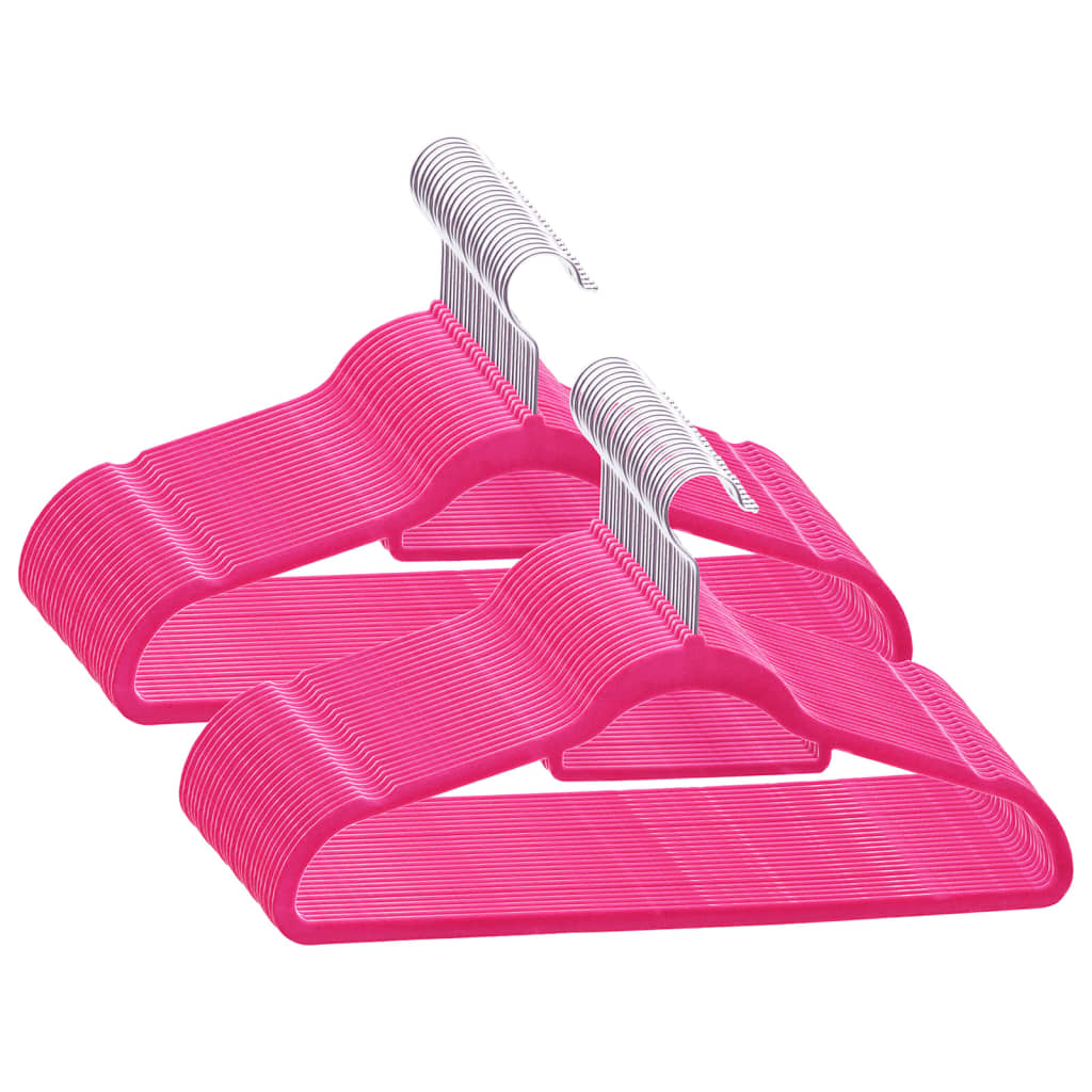 50-pack of pink velvet anti-slip clothes hangers with swivel hooks.