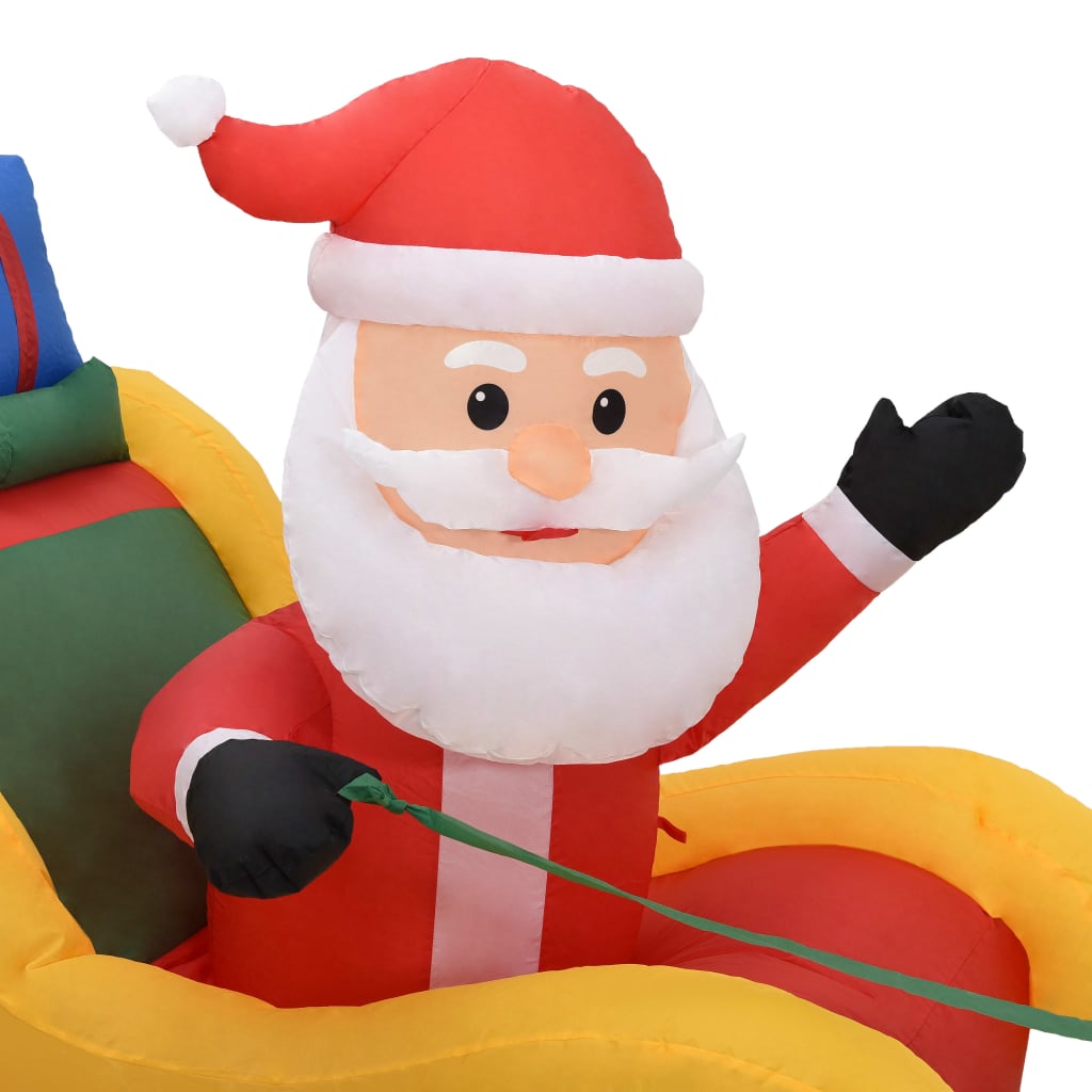 Inflatable Santa and reindeer decoration with multicolor LED lights.