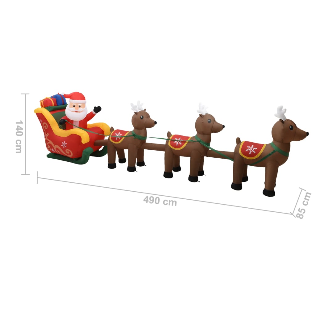 Inflatable multicolor Santa and reindeer decoration, 140 cm high and 490 cm wide.