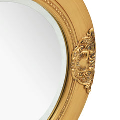 A 19.7-inch round gold baroque wall mirror with ornate frame.