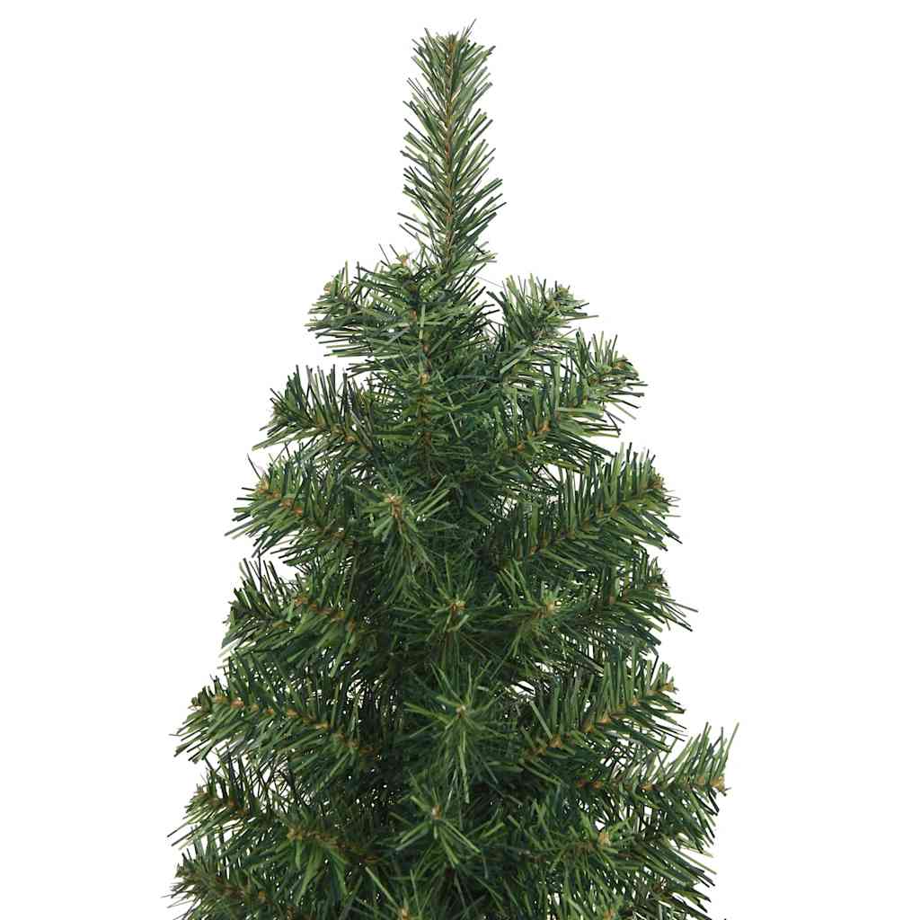 An 8 ft slim artificial Christmas tree with green PVC branches on a steel stand.