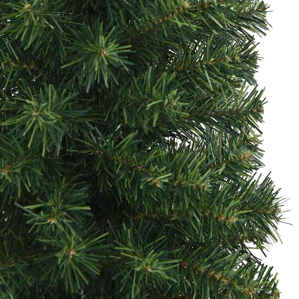 An 8 ft slim artificial Christmas tree with green PVC branches on a steel stand.