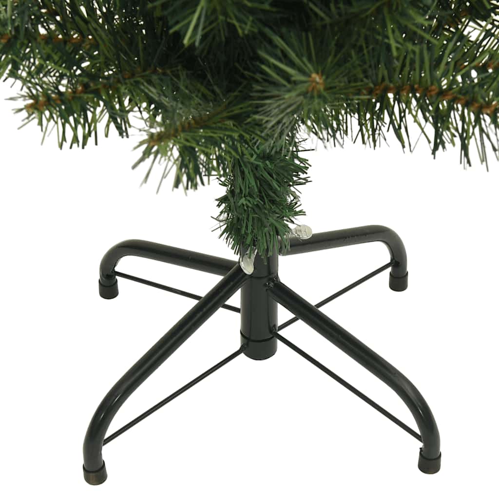 An 8-foot slim artificial Christmas tree with green PVC branches on a black metal stand.