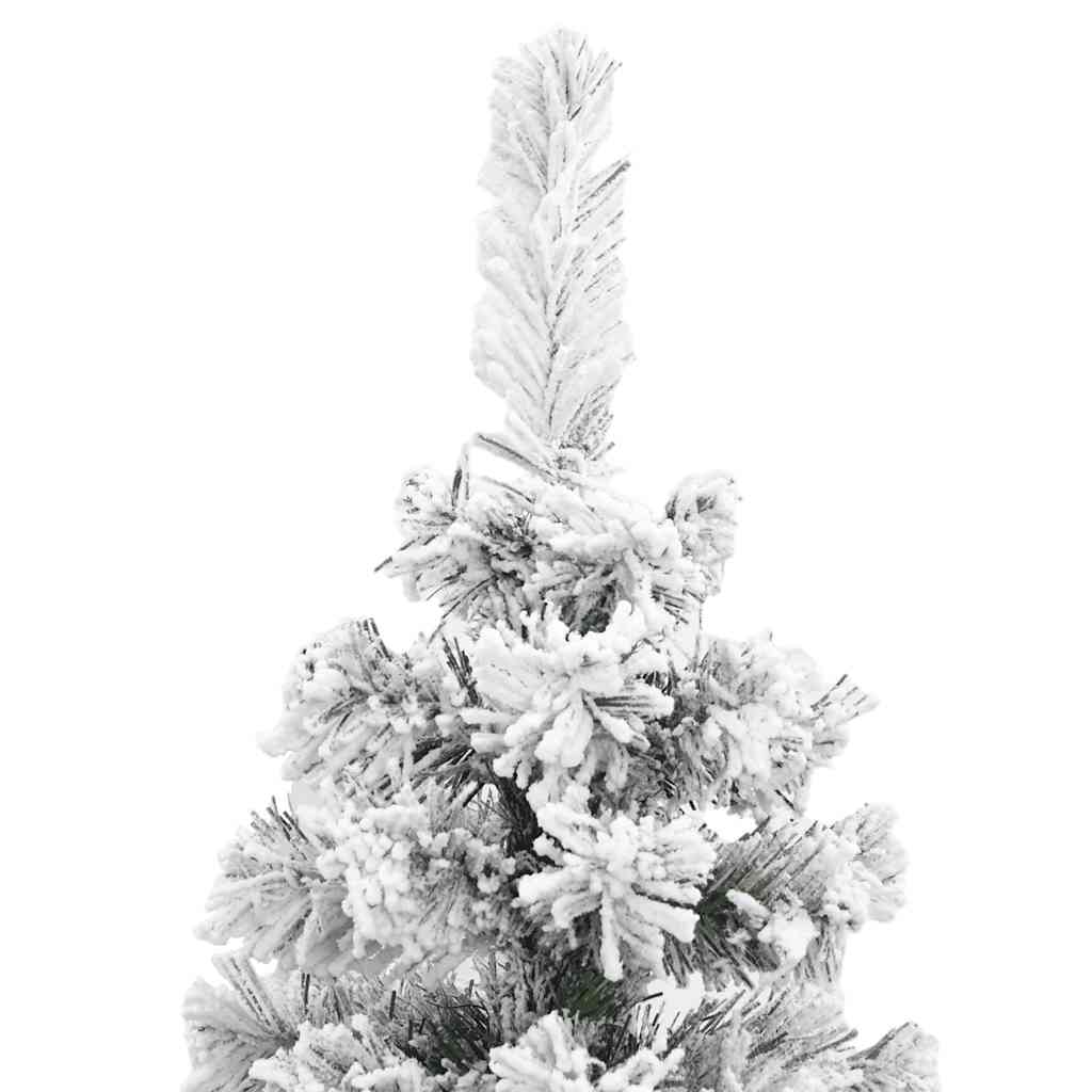 A 6 ft slim artificial Christmas tree with green PVC branches flocked in white snow.