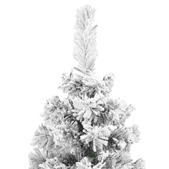 A 6 ft slim artificial Christmas tree with green PVC branches flocked in white snow.