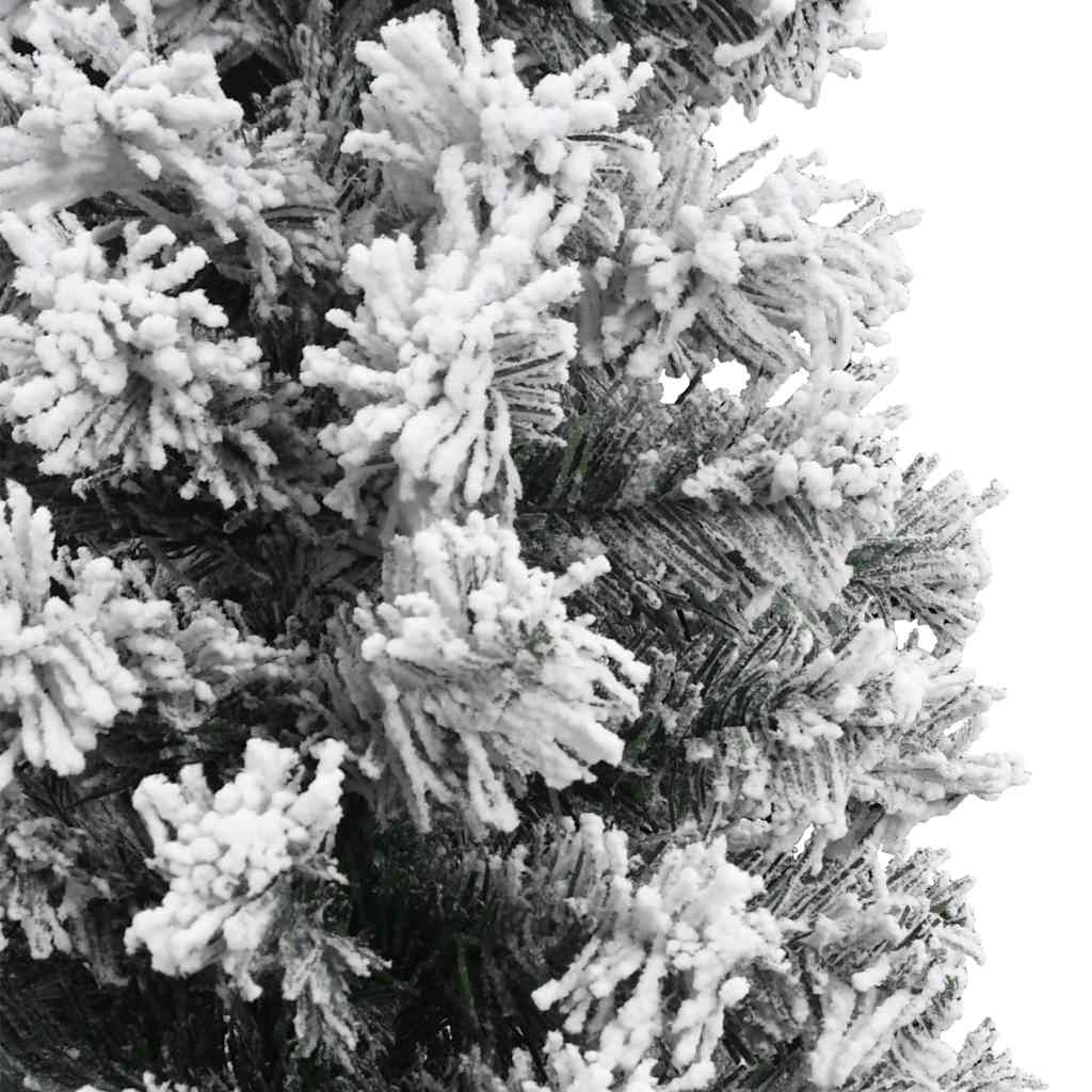 A 6 ft slim artificial Christmas tree with green PVC branches flocked in white snow.
