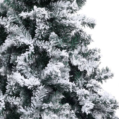 A 7 ft artificial Christmas tree with flocked snow on green PVC branches.