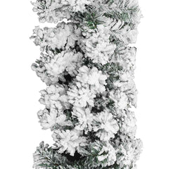 A 16-foot flocked snow green PVC Christmas garland with dense, artificial pine branches.