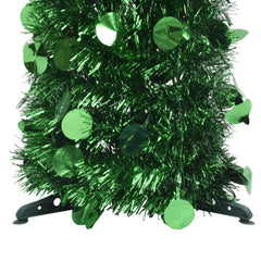5ft green artificial Christmas tree made of PET material with a slim design for small spaces.