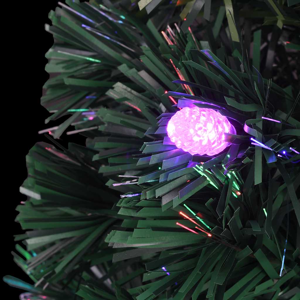 4ft green artificial Christmas tree with LED lights and sturdy steel stand.