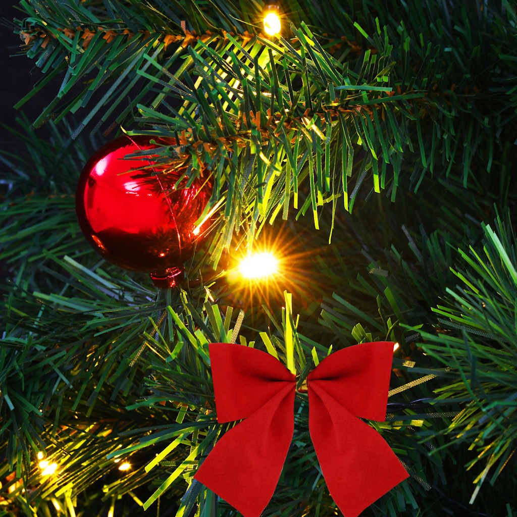 2ft pre-lit artificial Christmas tree in green with red baubles and bow.