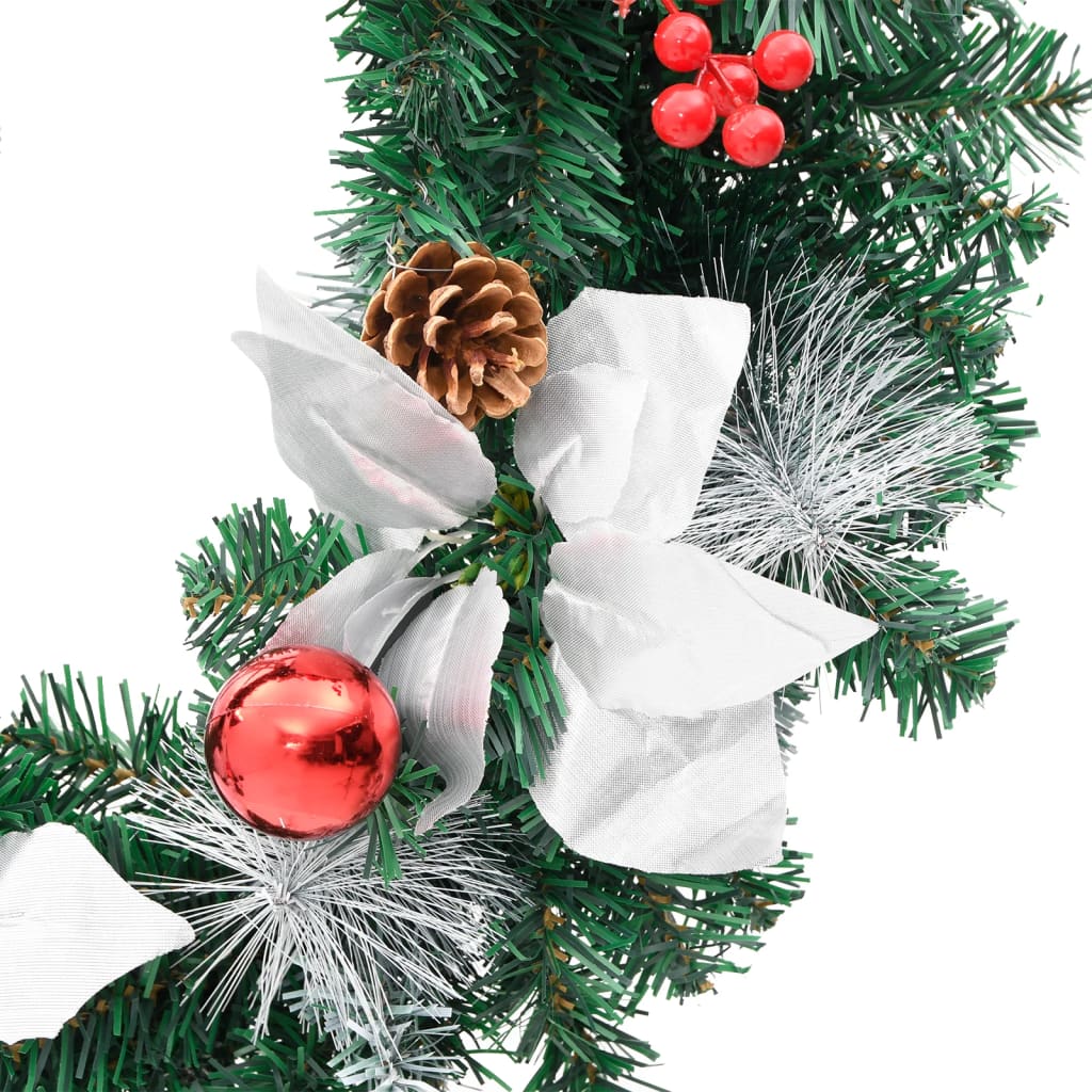 A 23.6-inch green PVC Christmas wreath with red berries, pinecones, white bows, and 20 LED lights.