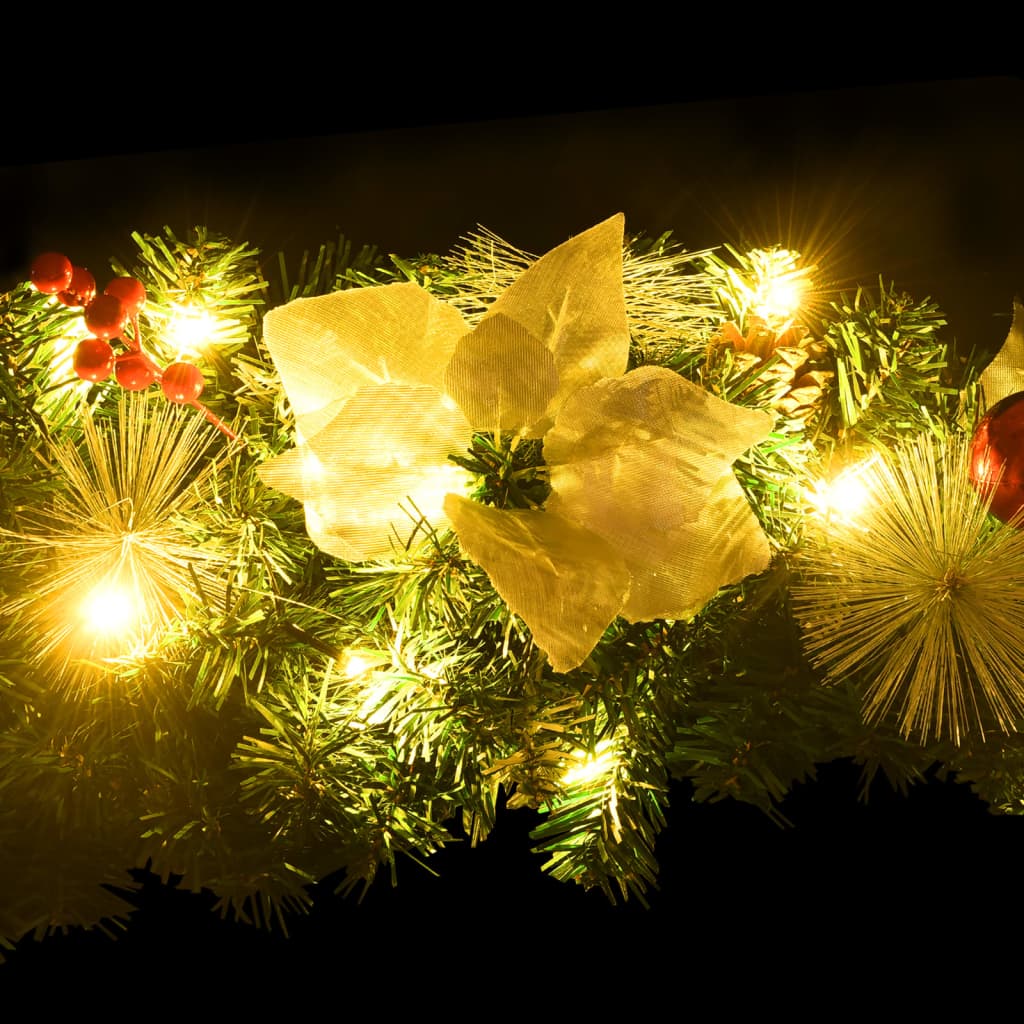 A 23.6-inch green PVC Christmas wreath with LED lights, red baubles, and frosted tips.