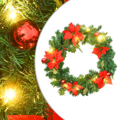 A 23.6-inch green PVC Christmas wreath with red poinsettias, LED lights, and ornaments.