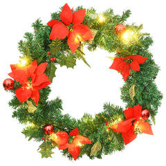 A 23.6-inch green PVC Christmas wreath with red poinsettias, holly, berries, and integrated LED lights.