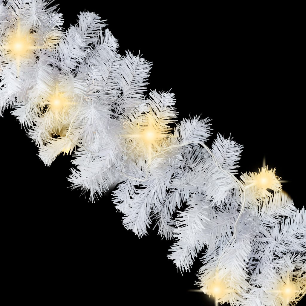 White 16 ft PVC Christmas garland with 75 warm white LED lights.