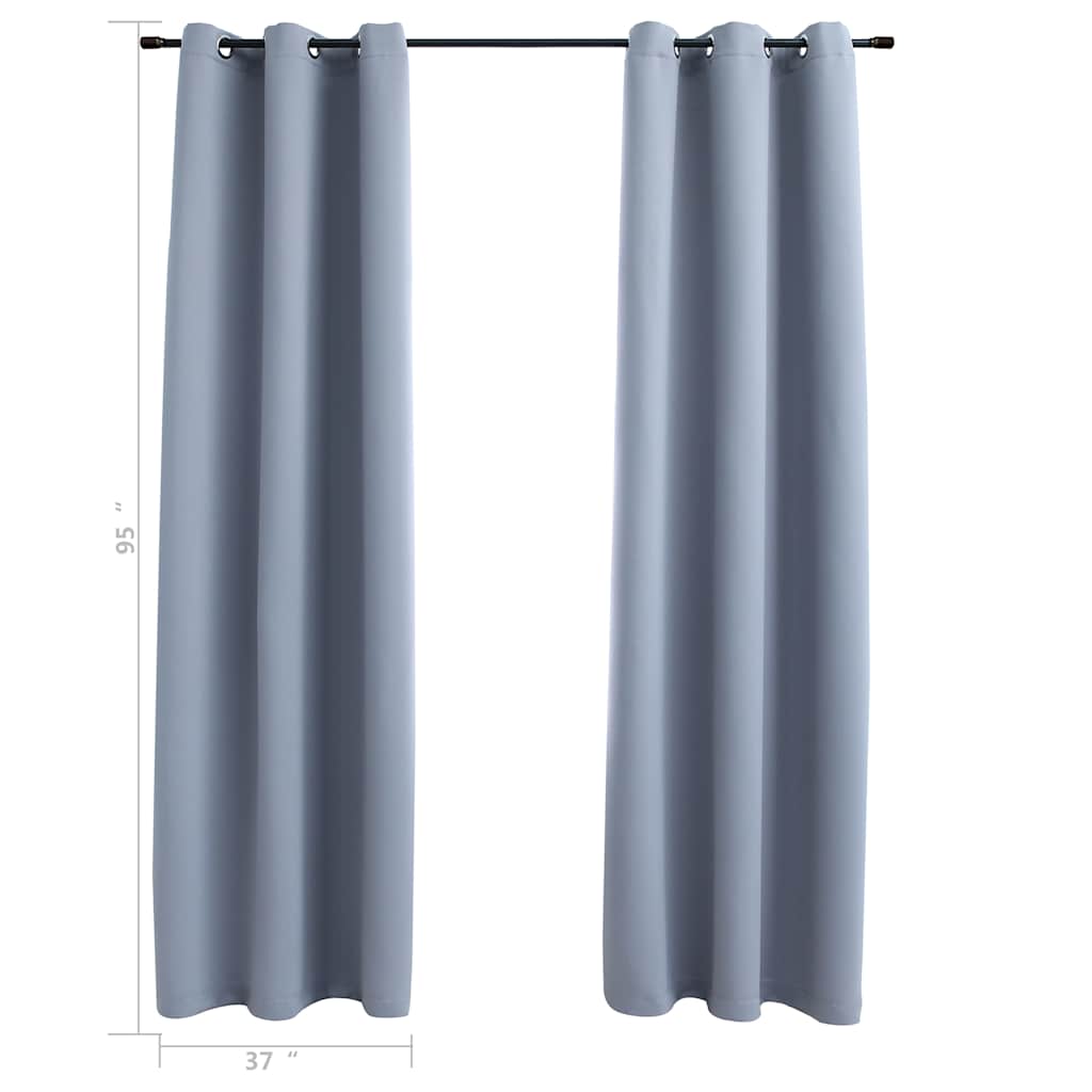 Two gray blackout curtain panels, 37x95 inches each, with metal rings on a rod.