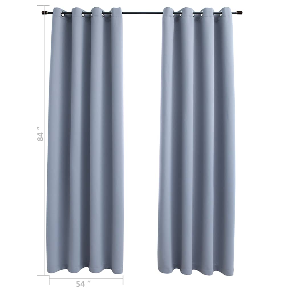 Two gray blackout curtain panels, 54x84 inches each, with rings on a rod.
