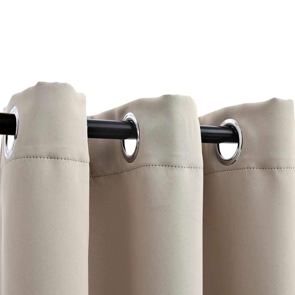 Two beige blackout curtain panels, 37x63 inches, with metal rings on a rod.
