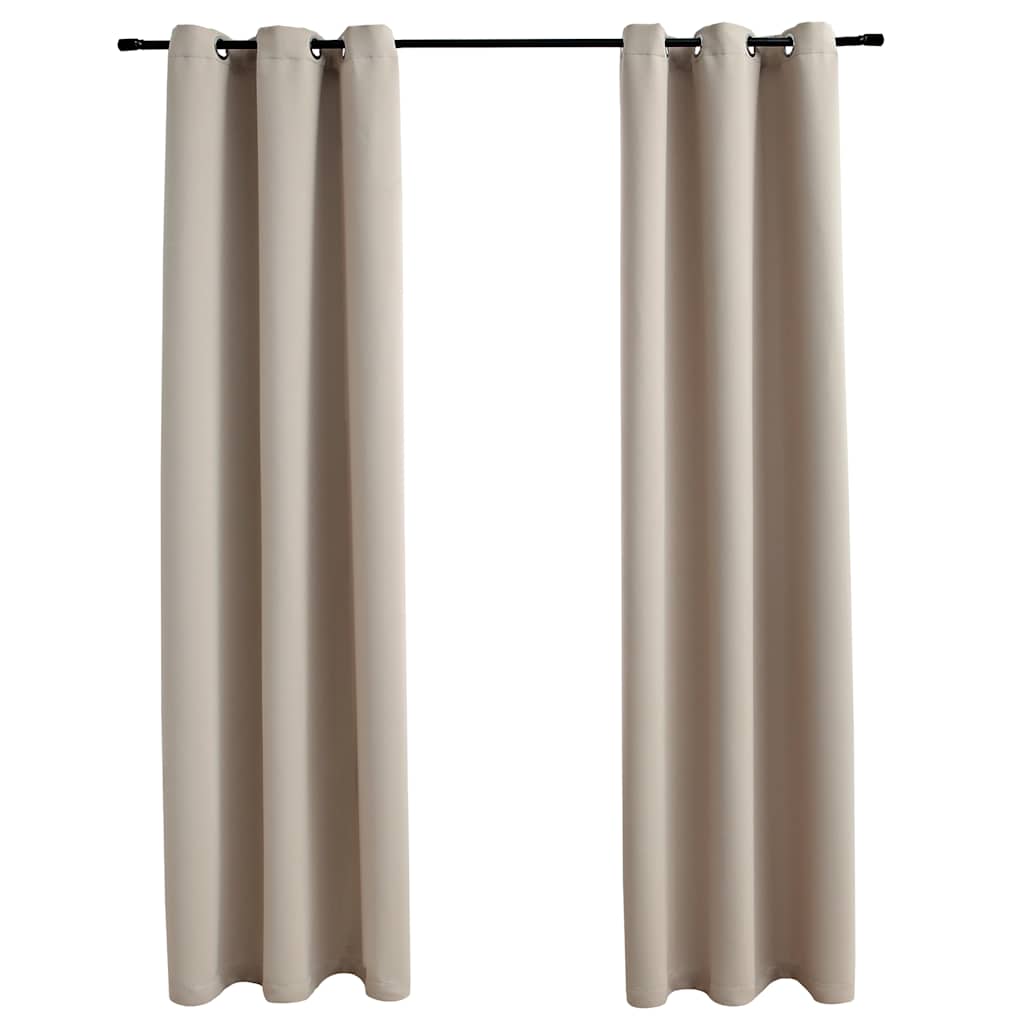 Two beige blackout curtain panels, 37x84 inches each, with grommet rings on a rod.