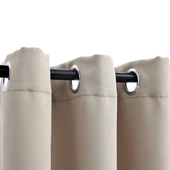 Two beige blackout curtain panels, 37x84 inches, with metal rings on a rod.
