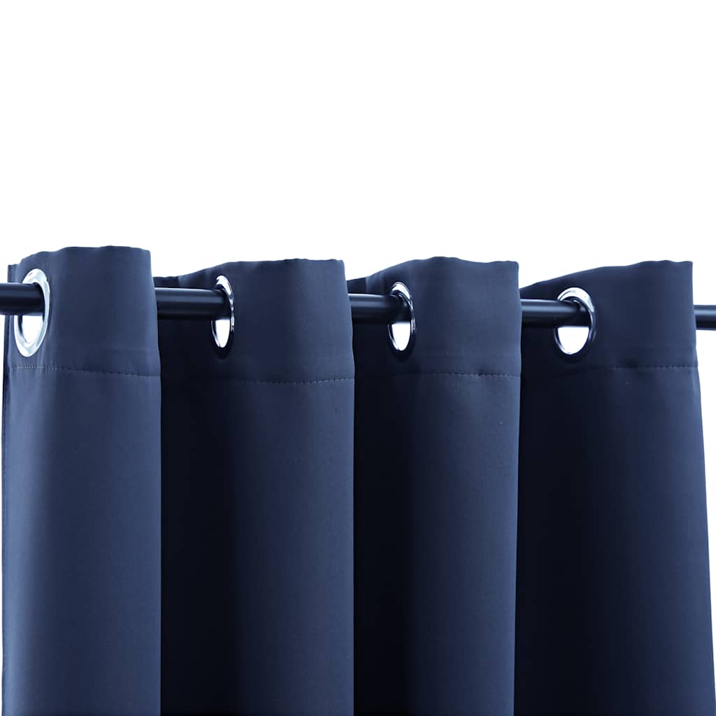 Navy blue blackout curtains with rings, 54x63 inches, two panels on a rod.