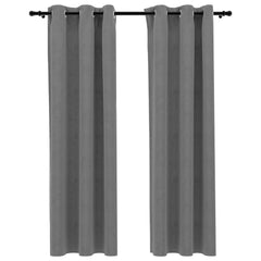 Two gray velvet blackout curtain panels, 37x63 inches, with metal rings on a rod.