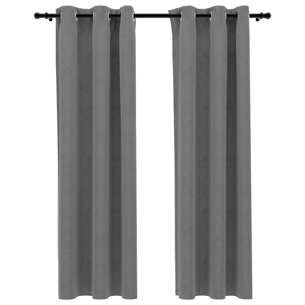 Pair of gray velvet blackout curtains, 37x84 inches each, with metal rings.