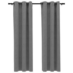 Pair of gray velvet blackout curtains, 37x84 inches each, with metal rings.